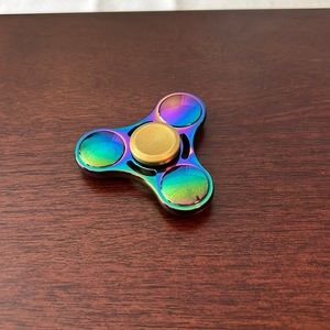 Barely used, metal rainbow fidget spinner